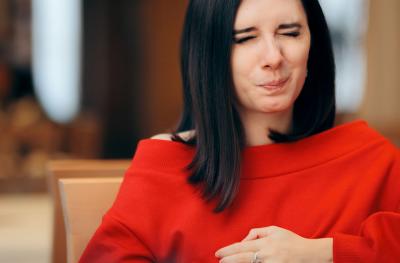 woman with heartburn