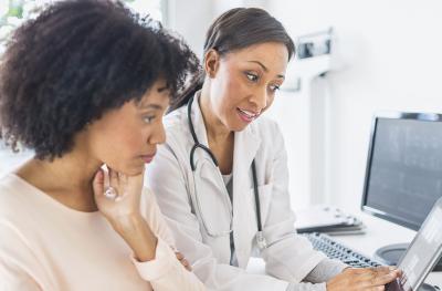 female doctor with female patient