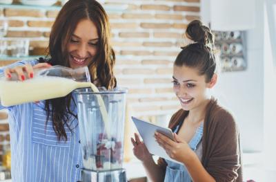 women coooking with a blender