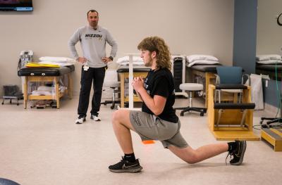 Jake Pickens during his twice-weekly physical therapy at the Boonville location of Mizzou Therapy Services.