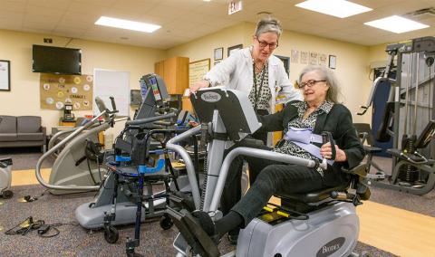 Dr. Mary Dohrmann works with a patient. 