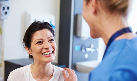 Patient with health care worker.