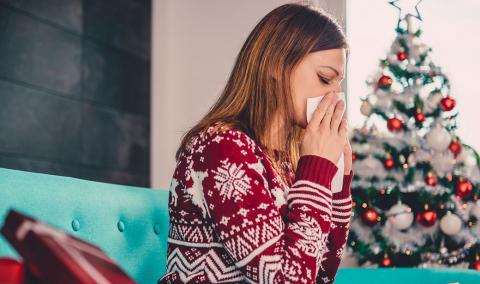 Woman Sneezing