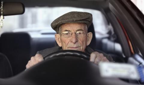 elderly man driving