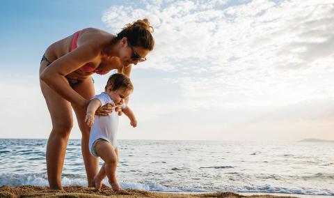 mother and child on the beach