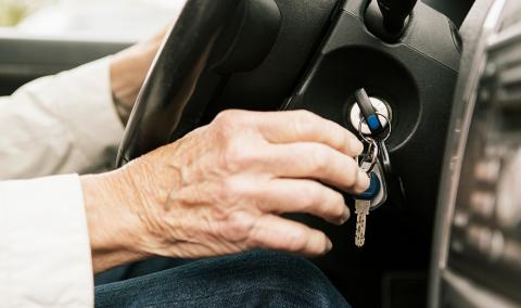 elderly person driving