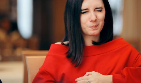 woman with heartburn