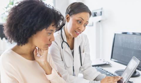 female doctor with female patient