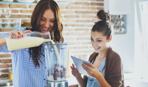 women coooking with a blender