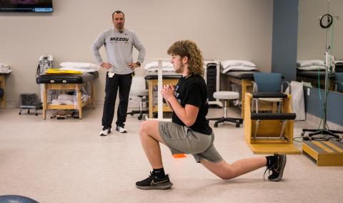 Jake Pickens during his twice-weekly physical therapy at the Boonville location of Mizzou Therapy Services.