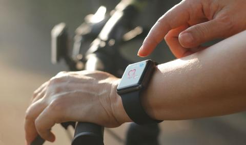 Person monitoring their heart rate on their watch