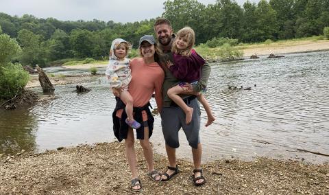 A photo of a family spending time at the lake.