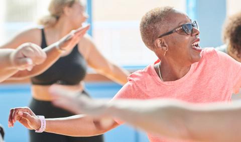 A photo of a group of women exercising.