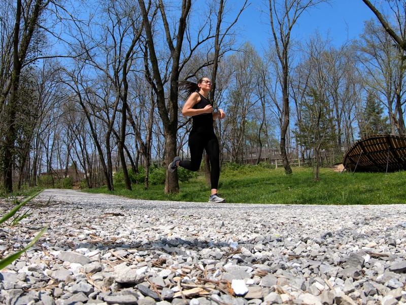 Woman runs on MKT Trail