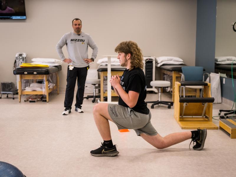 Boonville High School senior offensive lineman Jake Pickens does a rehabilitation exercise at MU Health Care's Jackson Road Medical Building in Boonville, Mo.