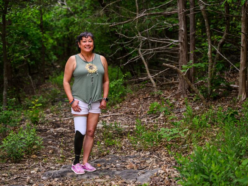 A photo of a woman outdoors.