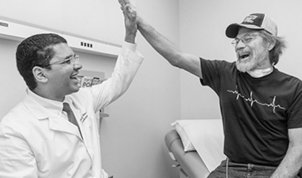 Photo of doctor-patient high-five