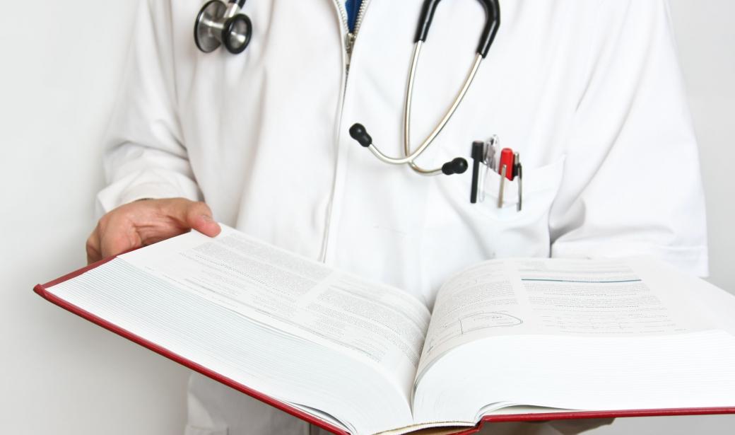 doctor with an open book