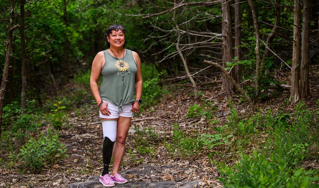 A photo of a woman outdoors.