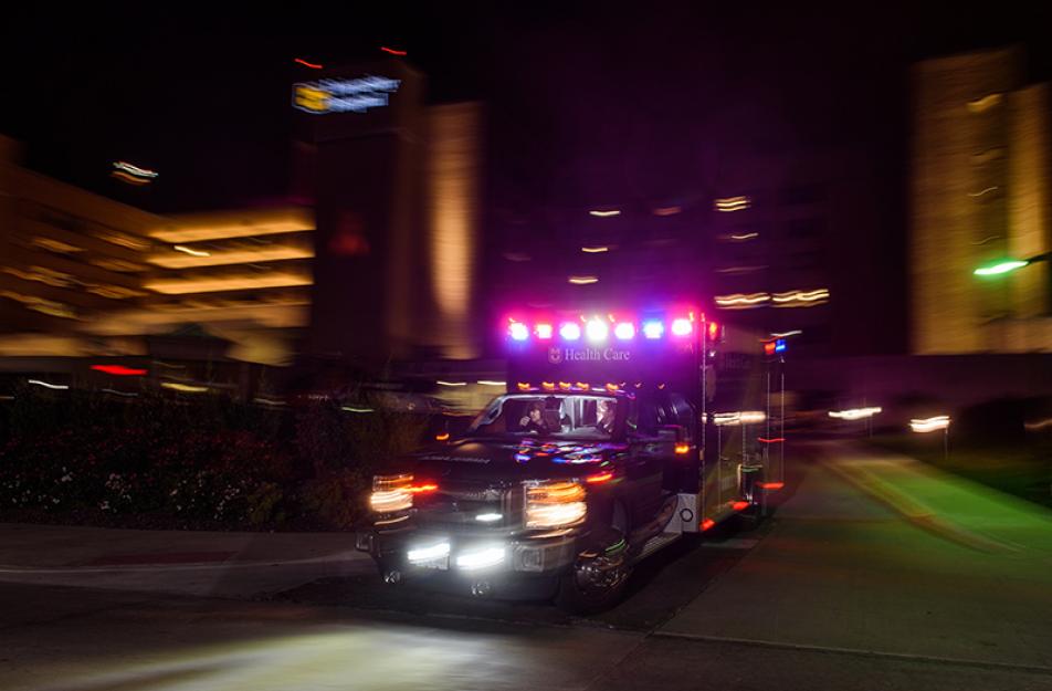 ambulance with lights on at night