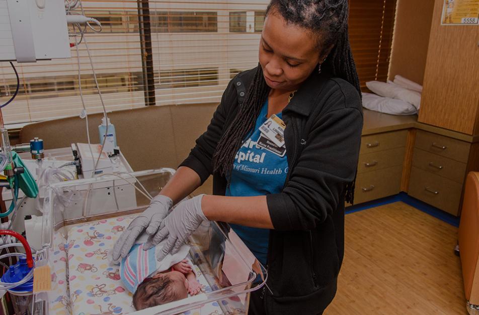 nurse with infant