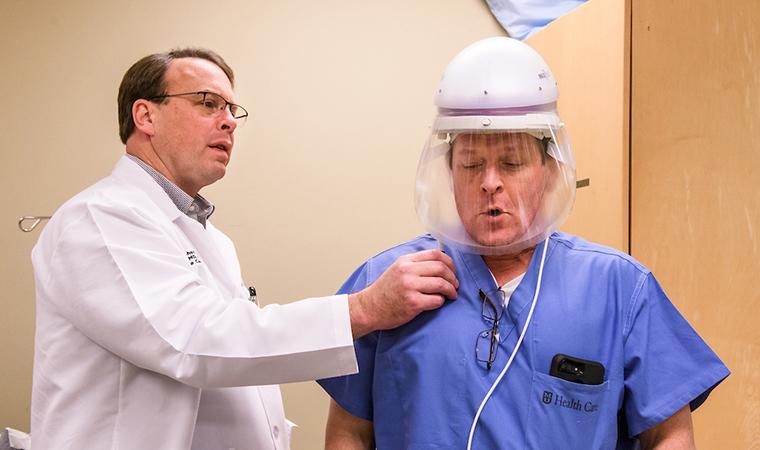 Doctors testing of a prototype CAPR mask