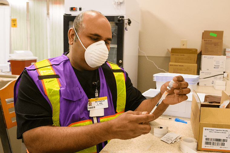 Photo of COVID-19 vaccine administration