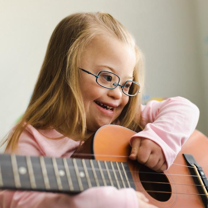 Kaylee playing guitar