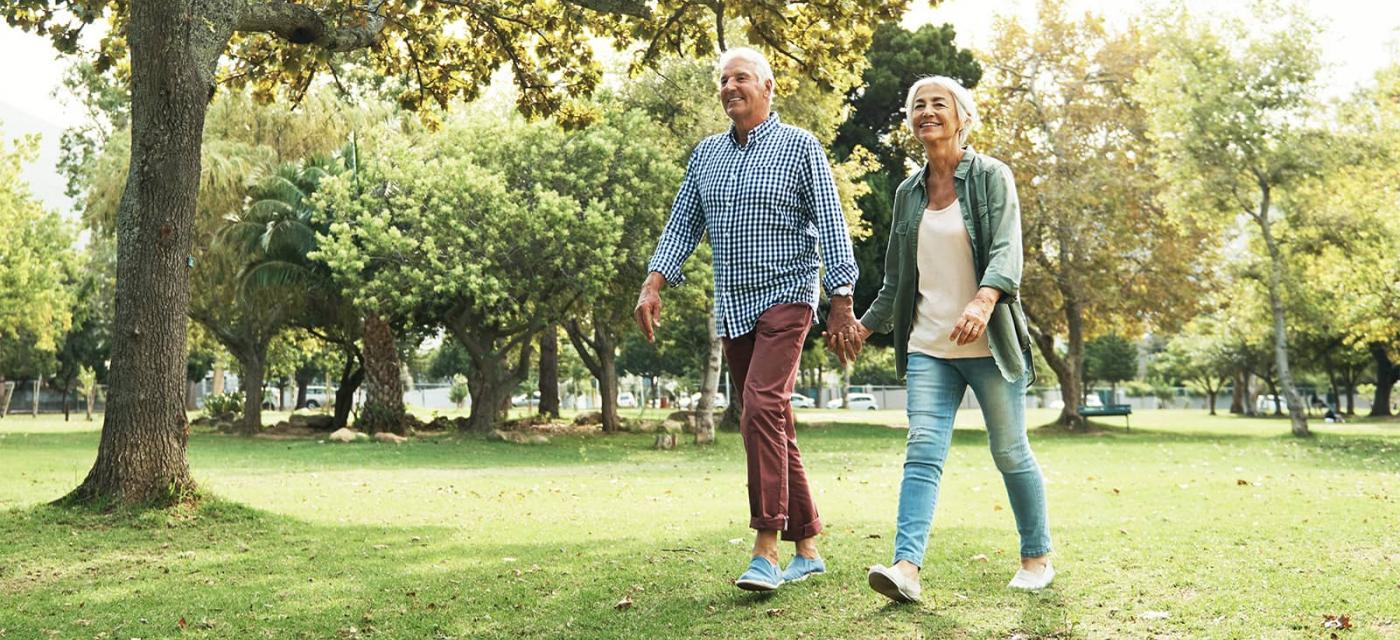 Photo of older couple walking