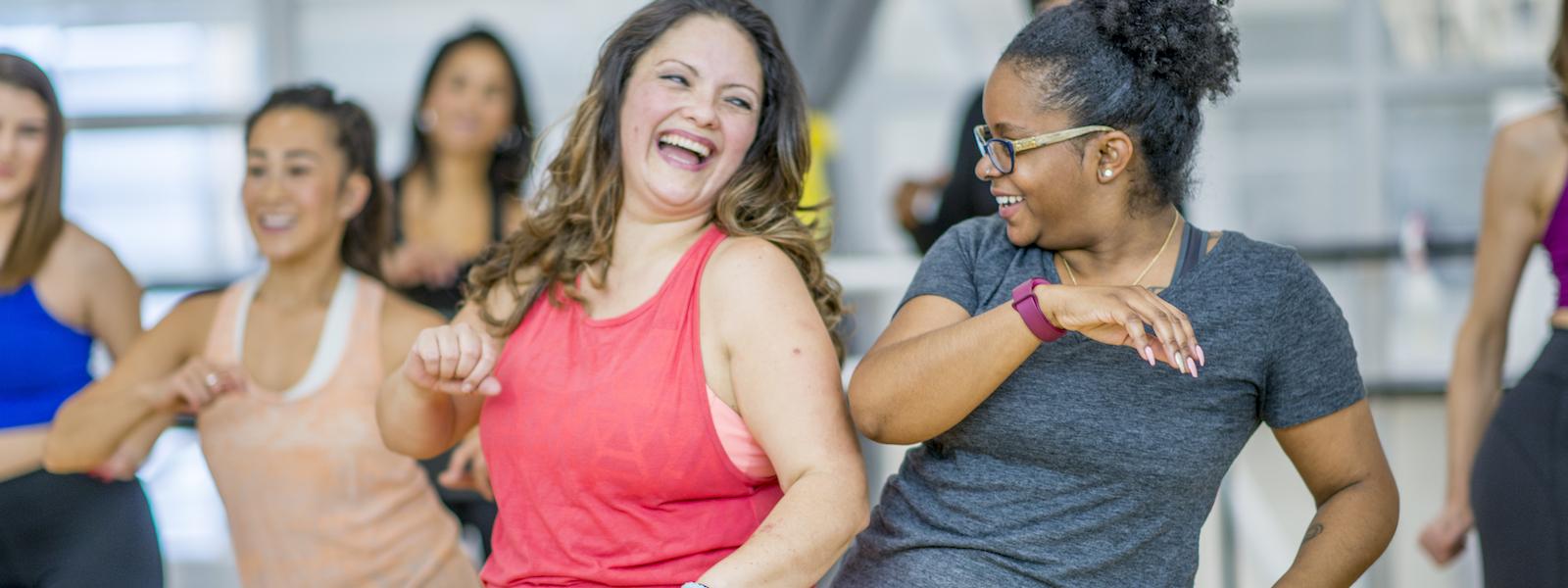 group of women dancing in fitness studio