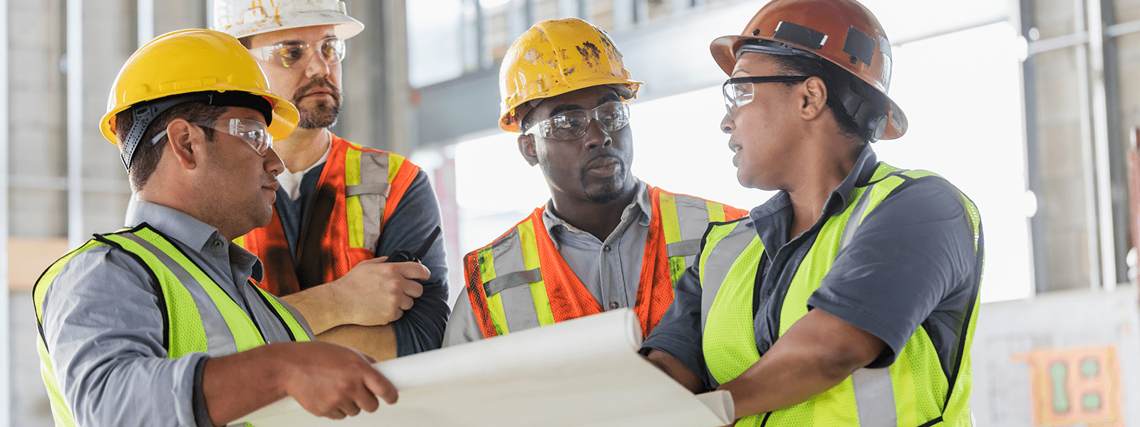 Photo of construction workers on job site