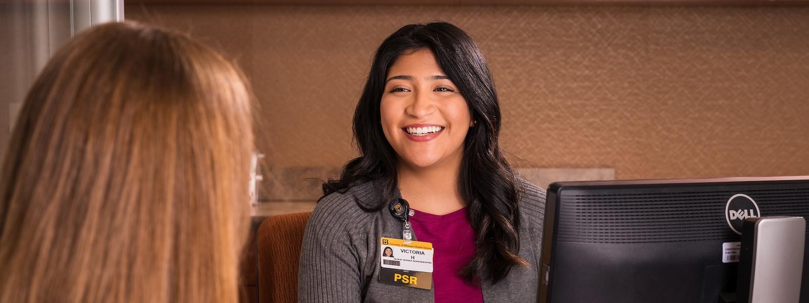 Patient rep checking in a patient